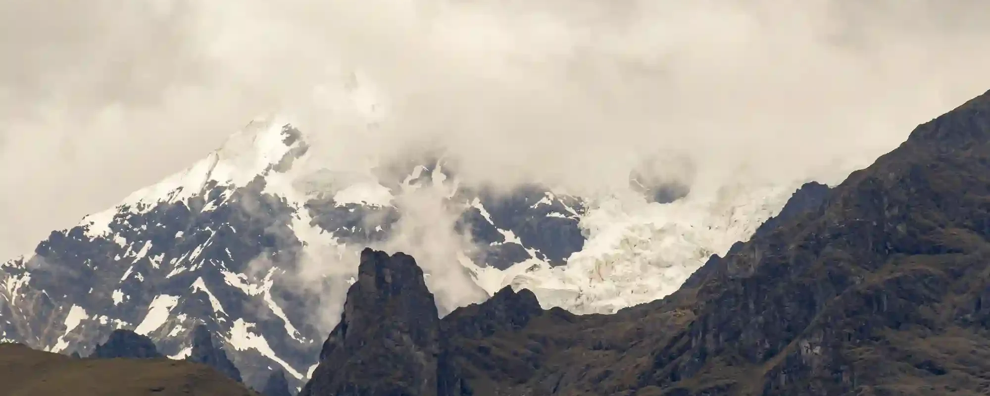 High Andean trekking to Machu Picchu through Humantay Lake, Salkantay Pass and cloud forest trails.