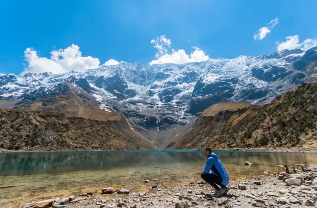 rear-view-man-traveler-front-humantay-lake-cusco-trekking-concept