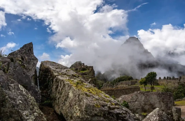panoramic-view-machu-picchu-ruins-surrounded-by-misty-mountains-peru (1)
